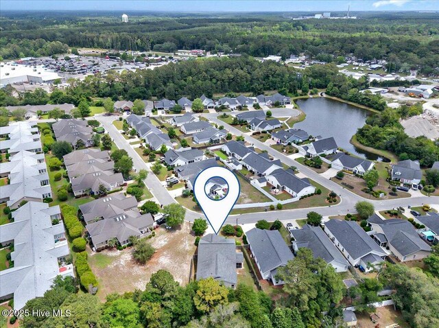 2121 Maple Leaf Dr, Southport, NC 28461 - aerial overview of property's location with a forest and nearby suburban area