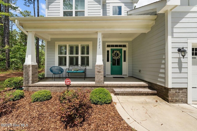 1225 Morganton Rd, Pinehurst, NC 28374 - doorway to property with covered porch