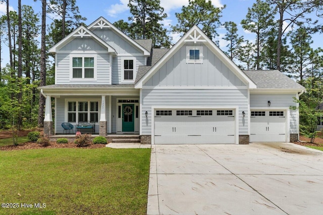 1225 Morganton Rd, Pinehurst, NC 28374 - craftsman inspired home featuring an attached garage, board and batten siding, a porch, driveway, and a front lawn