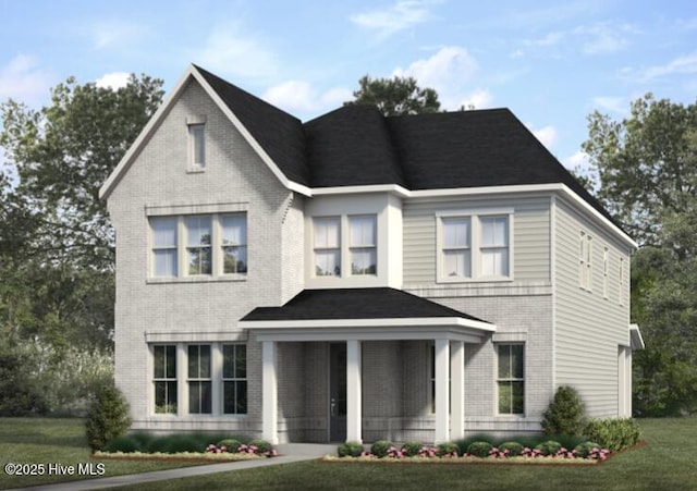 3924 Watersail Dr Unit 88, Wilmington, NC 28409 - view of front facade with brick siding, covered porch, and a front yard