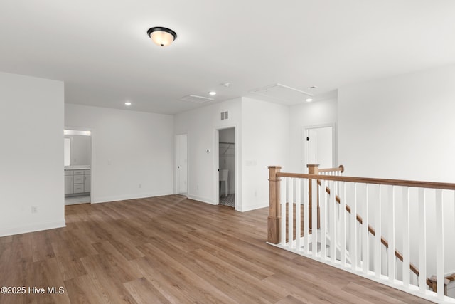 3924 Watersail Dr Unit 88, Wilmington, NC 28409 - empty room with attic access, recessed lighting, wood finished floors, and baseboards