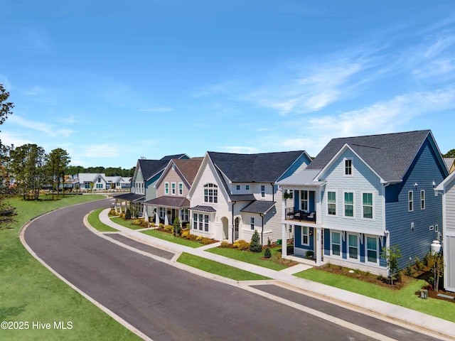 3924 Watersail Dr Unit 88, Wilmington, NC 28409 - view of front of house with a standing seam roof, metal roof, a residential view, and a shingled roof