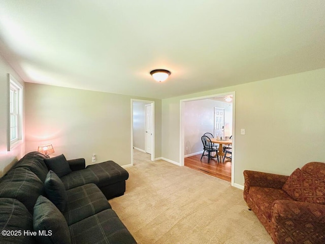 502 Dogwood Ln, Jacksonville, NC 28540 - living room with light colored carpet and baseboards