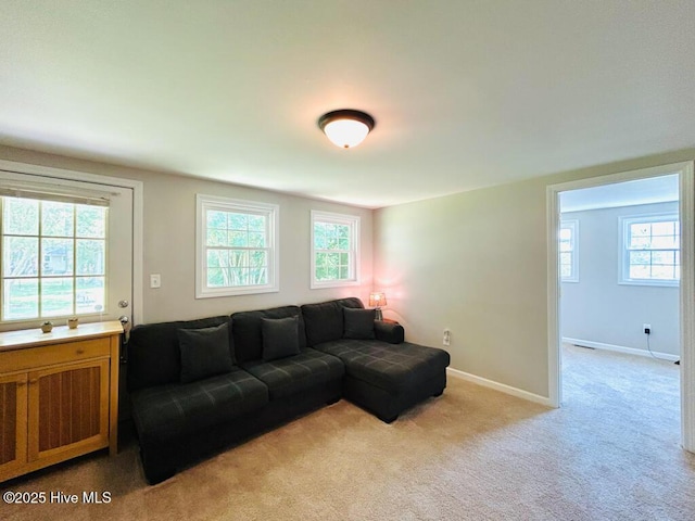 502 Dogwood Ln, Jacksonville, NC 28540 - living room featuring light colored carpet and baseboards