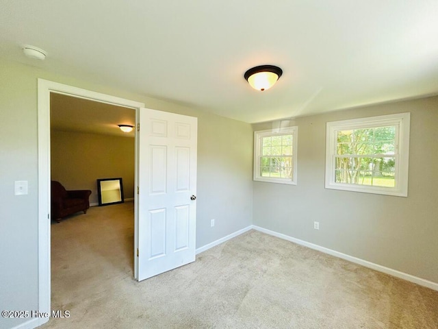 502 Dogwood Ln, Jacksonville, NC 28540 - unfurnished bedroom with carpet floors and baseboards