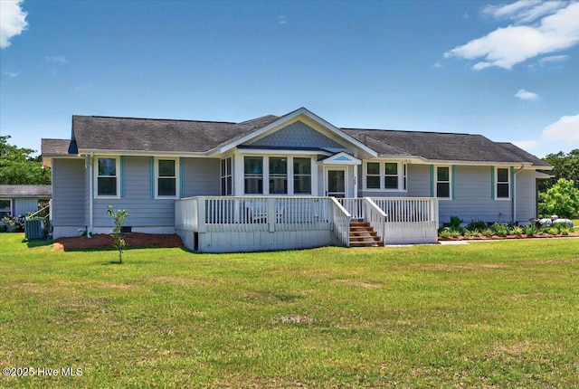 245 Green Bay Rd NW, Ocean Isle Beach, NC 28469 - ranch-style house with a porch, a front yard, and cooling unit