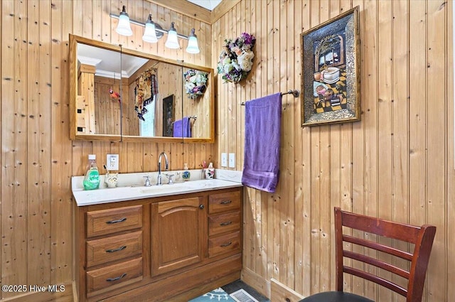 245 Green Bay Rd NW, Ocean Isle Beach, NC 28469 - bathroom with wood walls and vanity