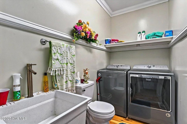 245 Green Bay Rd NW, Ocean Isle Beach, NC 28469 - laundry room featuring washer and clothes dryer and crown molding