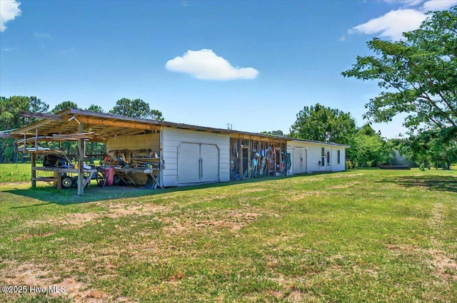 245 Green Bay Rd NW, Ocean Isle Beach, NC 28469 - view of outbuilding featuring a carport