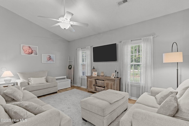 817 Glenarthur Dr, Wilmington, NC 28412 - living area featuring healthy amount of natural light, a ceiling fan, vaulted ceiling, wood finished floors, and baseboards