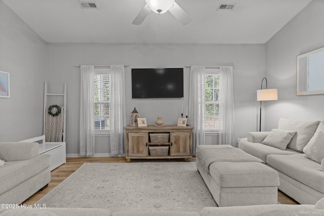 817 Glenarthur Dr, Wilmington, NC 28412 - living area with a ceiling fan, wood finished floors, and baseboards