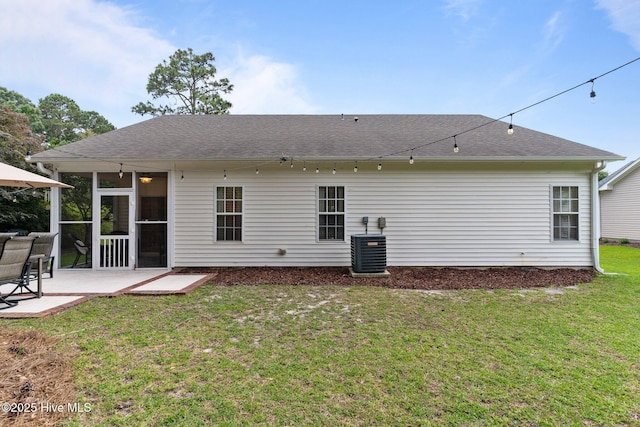 817 Glenarthur Dr, Wilmington, NC 28412 - back of house with a patio, cooling unit, a lawn, roof with shingles, and a sunroom