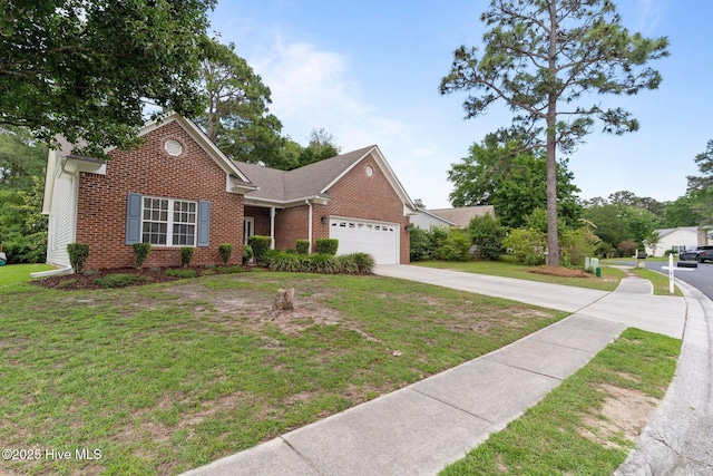 817 Glenarthur Dr, Wilmington, NC 28412 - view of front of home with brick siding, an attached garage, concrete driveway, and a front yard