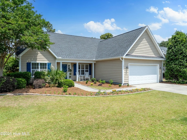 5018 Summerswell Ln, Southport, NC 28461 - view of front facade with a garage, roof with shingles, concrete driveway, and a front yard