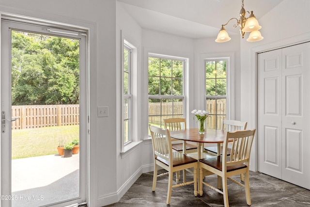5018 Summerswell Ln, Southport, NC 28461 - dining area with a chandelier