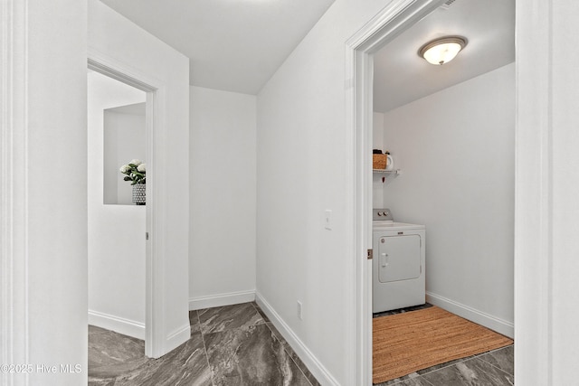 5018 Summerswell Ln, Southport, NC 28461 - laundry area featuring marble look tiles, baseboards, and washer and dryer