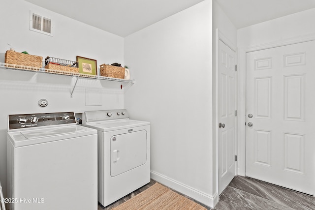 5018 Summerswell Ln, Southport, NC 28461 - laundry area featuring independent washer and dryer and baseboards
