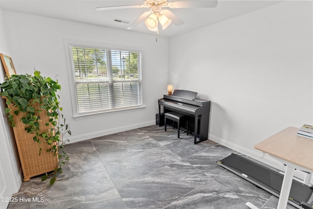 5018 Summerswell Ln, Southport, NC 28461 - living area featuring a ceiling fan and baseboards