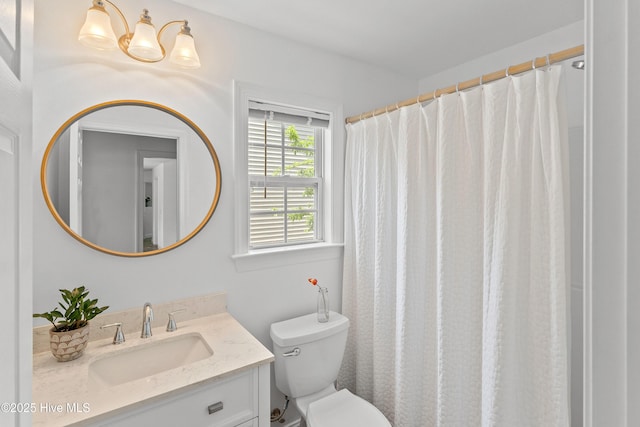 5018 Summerswell Ln, Southport, NC 28461 - bathroom featuring vanity, toilet, a chandelier, and a shower with shower curtain