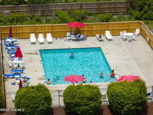 5018 Summerswell Ln, Southport, NC 28461 - community pool with a patio area