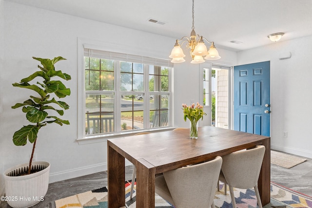 5018 Summerswell Ln, Southport, NC 28461 - dining room with baseboards and a chandelier