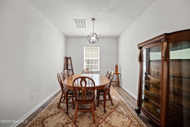 4345 Nine Iron Dr, Ayden, NC 28513 - dining area featuring wood finished floors and baseboards