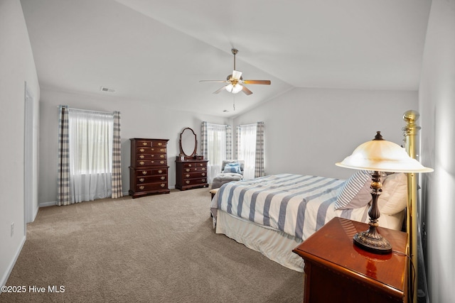 4345 Nine Iron Dr, Ayden, NC 28513 - carpeted bedroom featuring multiple windows, lofted ceiling, a ceiling fan, and baseboards