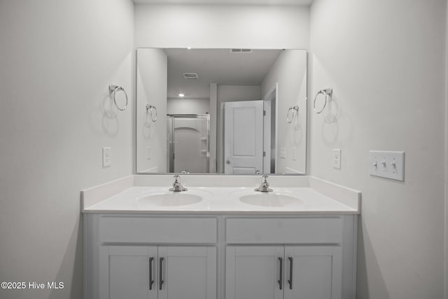 4345 Nine Iron Dr, Ayden, NC 28513 - bathroom with double vanity and a stall shower