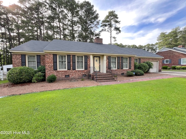 1811 Hermitage Rd NW, Wilson, NC 27896 - ranch-style house featuring an attached garage, brick siding, a chimney, and crawl space