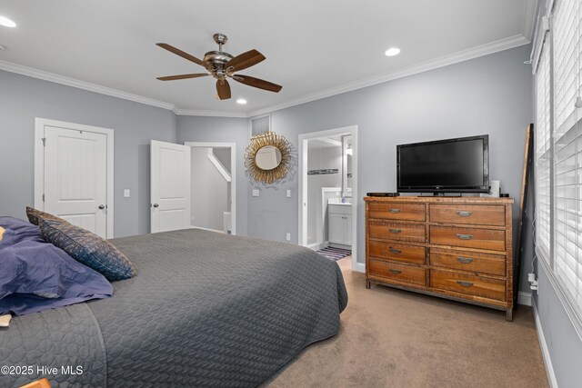 117 Bimini Townes Ln, Carolina Beach, NC 28428 - bedroom with crown molding, recessed lighting, carpet floors, baseboards, and ensuite bathroom