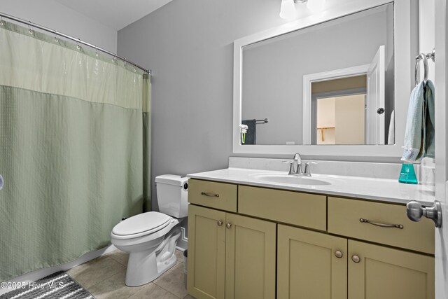 117 Bimini Townes Ln, Carolina Beach, NC 28428 - full bath with toilet, vanity, tile patterned floors, and a shower with shower curtain