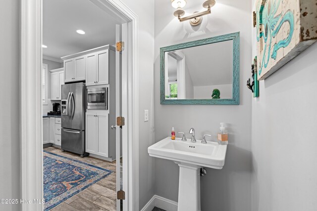 117 Bimini Townes Ln, Carolina Beach, NC 28428 - bathroom featuring baseboards and recessed lighting