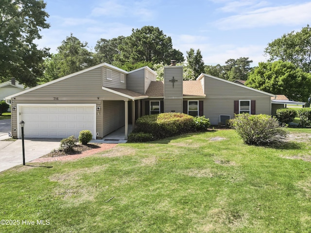 716 Shadowridge Rd, Jacksonville, NC 28546 - mid-century home with a garage, concrete driveway, a chimney, a front lawn, and roof with shingles