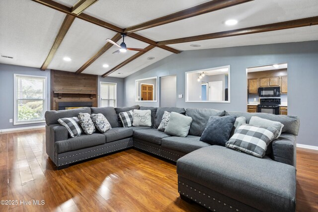 716 Shadowridge Rd, Jacksonville, NC 28546 - living room featuring wood finished floors, baseboards, plenty of natural light, and recessed lighting