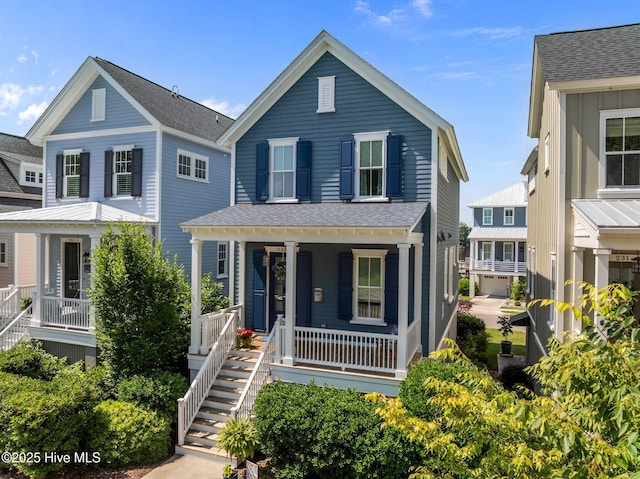 233 E Water St, Washington, NC 27889 - view of front facade with a porch, stairs, and roof with shingles