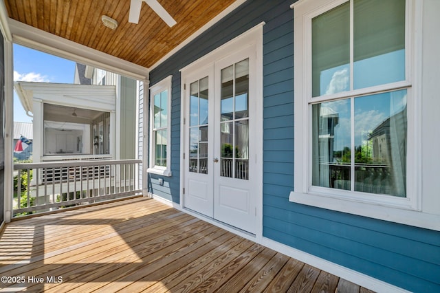 233 E Water St, Washington, NC 27889 - wooden porch with ceiling fan
