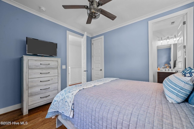 233 E Water St, Washington, NC 27889 - bedroom featuring wood finished floors, baseboards, crown molding, a ceiling fan, and ensuite bath