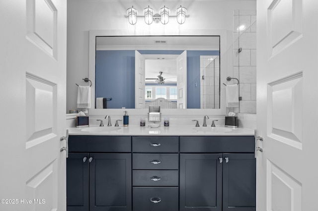 233 E Water St, Washington, NC 27889 - full bath with a ceiling fan, double vanity, and a tile shower