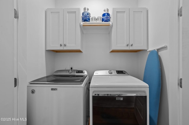 233 E Water St, Washington, NC 27889 - laundry area featuring cabinet space and separate washer and dryer