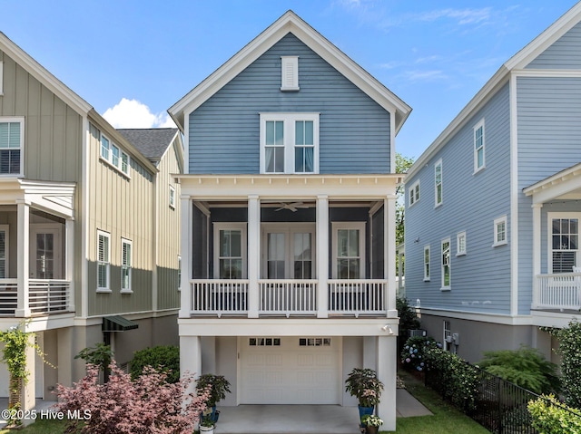 233 E Water St, Washington, NC 27889 - view of front of house with an attached garage and board and batten siding