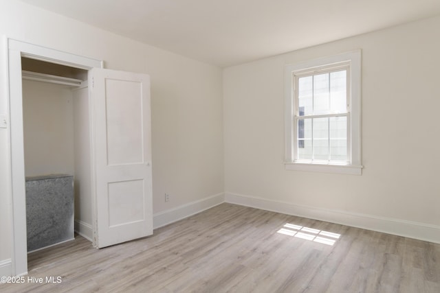 808 Cabarrus St, Edenton, NC 27932 - unfurnished bedroom with light wood-style floors and baseboards