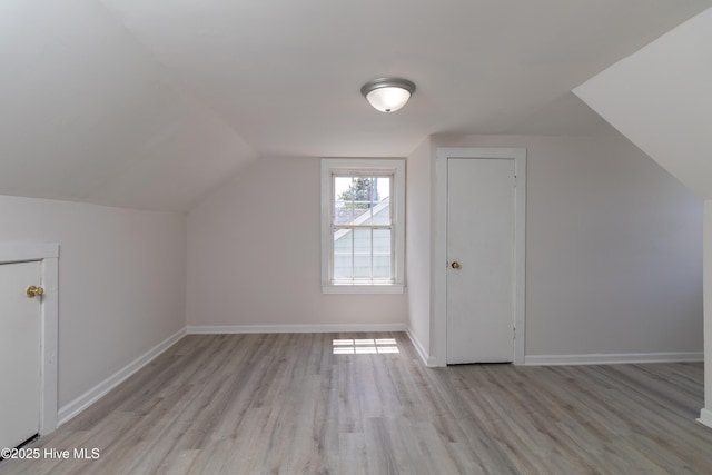 808 Cabarrus St, Edenton, NC 27932 - additional living space with light wood finished floors, vaulted ceiling, and baseboards