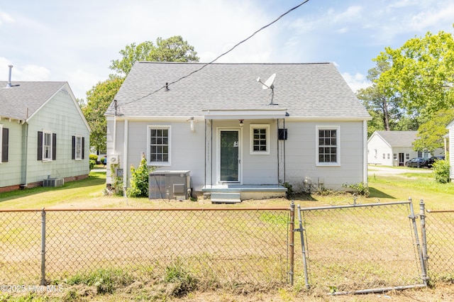808 Cabarrus St, Edenton, NC 27932 - view of front of house featuring a gate, roof with shingles, and central air condition unit