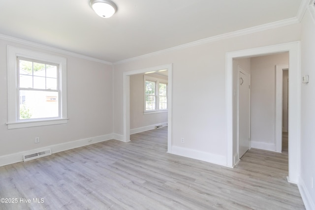 808 Cabarrus St, Edenton, NC 27932 - spare room featuring light wood-style floors, baseboards, and ornamental molding