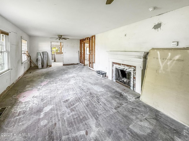 101 W Pearl St, Aulander, NC 27805 - unfurnished living room with ceiling fan and a fireplace