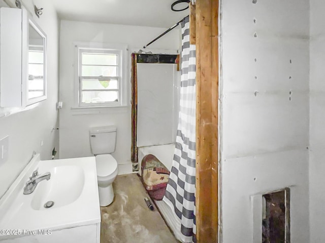101 W Pearl St, Aulander, NC 27805 - full bath with curtained shower, toilet, vanity, and unfinished concrete flooring