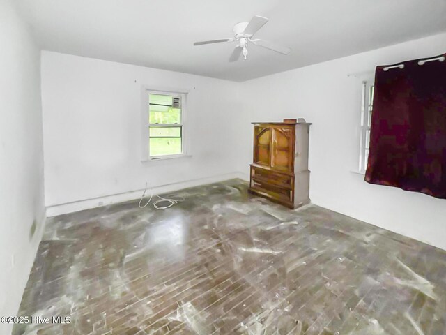 101 W Pearl St, Aulander, NC 27805 - spare room featuring ceiling fan, wood finished floors, and baseboards