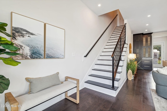 221 Georgia Ave, Carolina Beach, NC 28428 - staircase featuring wood finished floors, recessed lighting, and baseboards