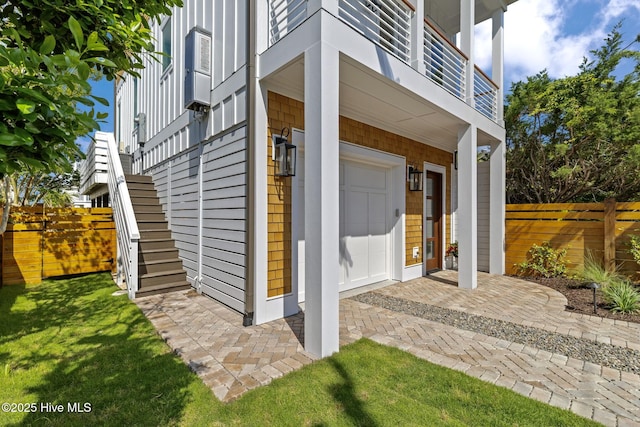 221 Georgia Ave, Carolina Beach, NC 28428 - property entrance with a garage