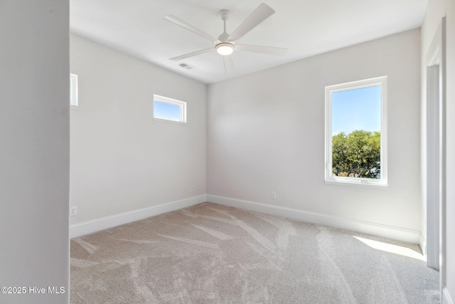 221 Georgia Ave, Carolina Beach, NC 28428 - carpeted spare room with a ceiling fan and baseboards